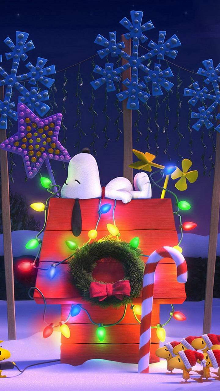 snoopy laying on his dog house christmas